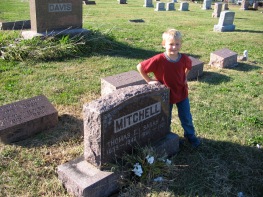 My son Ethan helped to find an elusive tombstone. Photo by Cari A. Taplin
